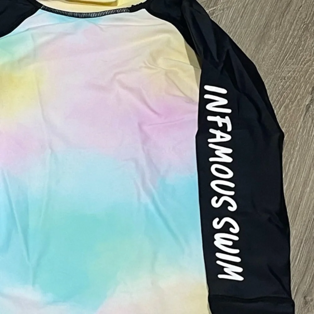 Infamous mini swim rash guard shirt size 0 Tie-dye design with black sleeves NWT